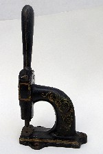 1854 1868 Lipman's Patent Improved Eyelet Machine side OM.jpg (27152 bytes)